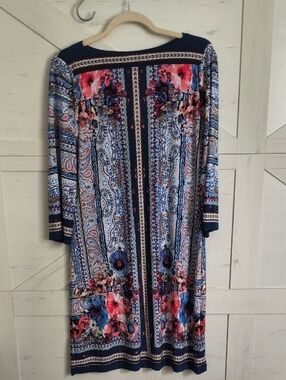 Cute dress. 3/4 Sleeve. Has Some Stretch To Fit Nicely!